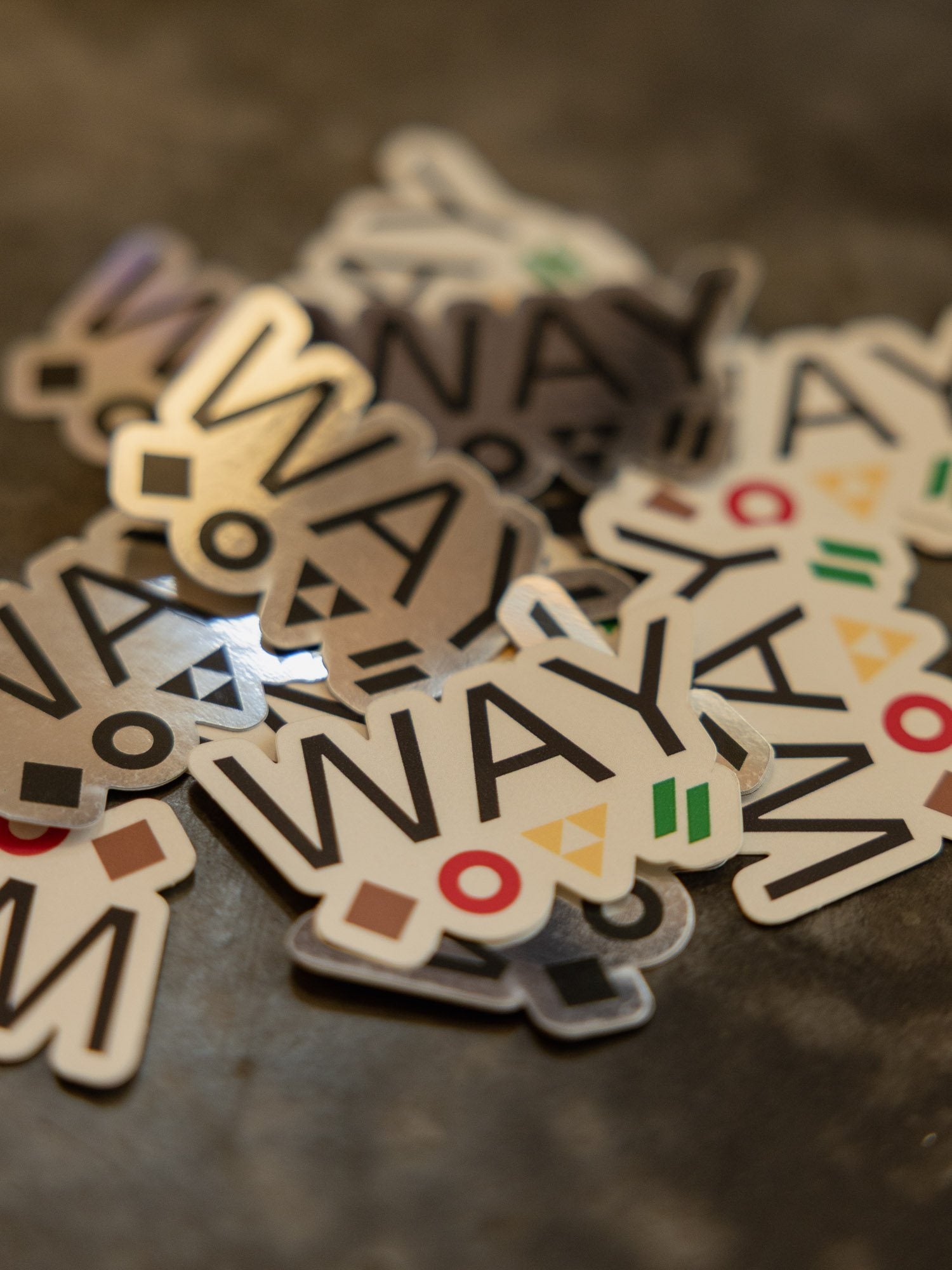 WAY-stickers met de vier symbolen